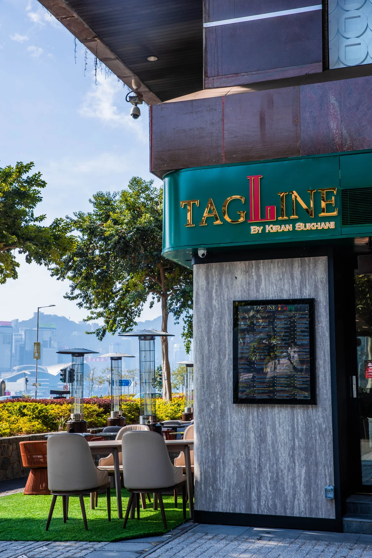 Tagline’s entrance at Empire Centre, with the patio and the harbour beyond