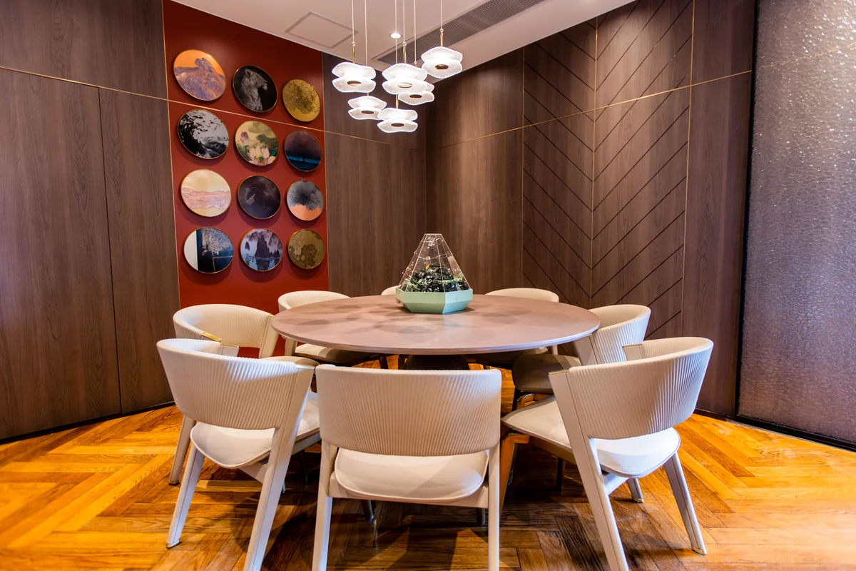 A round table set for a gathering in Tagline’s private dining room